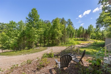 Welcome to Bearfoot Cabin, a charming mountain retreat perched - photo 13