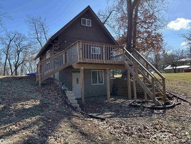This rustic log a-frame is versatile: a great summer cabin or - photo 2