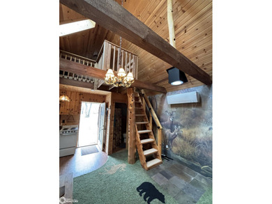 This rustic log a-frame is versatile: a great summer cabin or - photo 8
