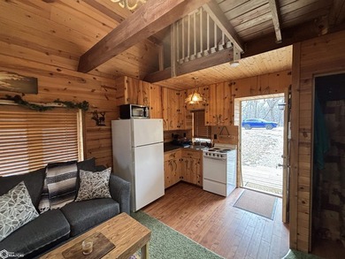 This rustic log a-frame is versatile: a great summer cabin or - photo 10