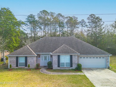 Freshly painted throughout, this inviting brick home offers - photo 1