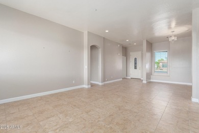 Gated community living at its best! This 4-bedroom, 2-bath home