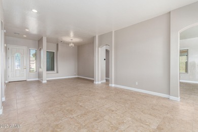 Gated community living at its best! This 4-bedroom, 2-bath home