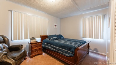 Lakefront living in the heart of Osage Beach at the 21MM! This