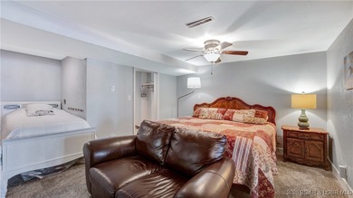 Lakefront living in the heart of Osage Beach at the 21MM! This