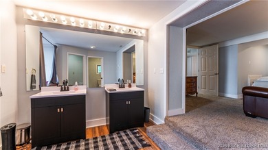 Lakefront living in the heart of Osage Beach at the 21MM! This