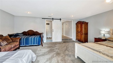 Lakefront living in the heart of Osage Beach at the 21MM! This