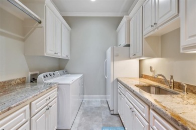 Custom-built and meticulously maintained, this beautiful