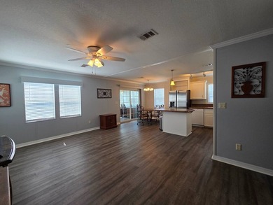 This 2 bed 2 bath 2012 home is located in Teakwood Village a 5 - photo 2