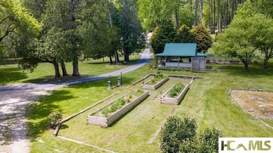 Frog Pond Farm is a 27-acre gated sanctuary just beyond the - photo 14