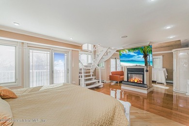 Perched above the water in S.E. Annadale, 133 Ryan Place doesn't - photo 17