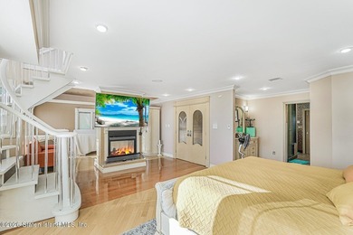 Perched above the water in S.E. Annadale, 133 Ryan Place doesn't - photo 19