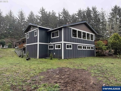Tucked away on 2.69 serene acres just minutes from the Oregon