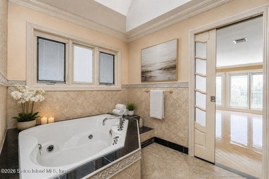 Perched above the water in S.E. Annadale, 133 Ryan Place doesn't - photo 23