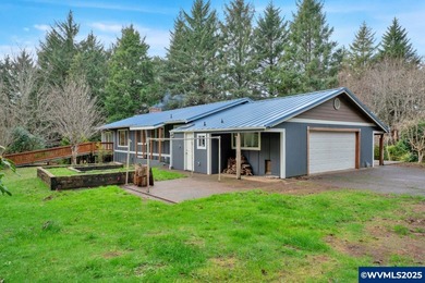 Tucked away on 2.69 serene acres just minutes from the Oregon