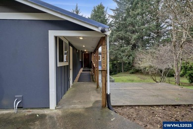 Tucked away on 2.69 serene acres just minutes from the Oregon