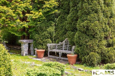 Frog Pond Farm is a 27-acre gated sanctuary just beyond the - photo 27