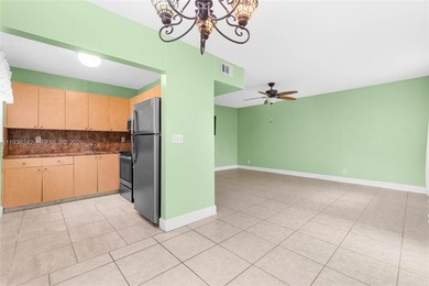 Desirable 1st floor- corner unit (only one neighbor) with