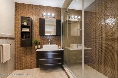 Perched above the water in S.E. Annadale, 133 Ryan Place doesn't - photo 28
