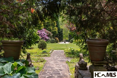 Frog Pond Farm is a 27-acre gated sanctuary just beyond the - photo 32