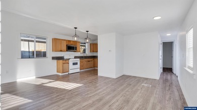 Welcome to this charming manufactured home featuring 2 bedrooms