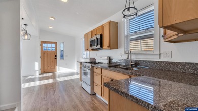 Welcome to this charming manufactured home featuring 2 bedrooms