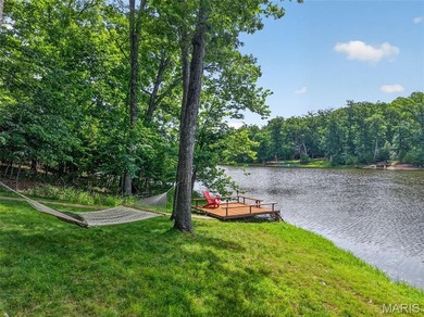 Perfectly located on the shores of Whitetail Lake, this - photo 8