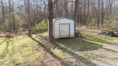 Welcome to this 4-bedroom, 2-bathroom manufactured home situated - photo 12