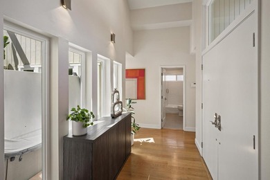 Step into this absolutely stunning modern home and feel an - photo 13