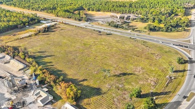 Prime commercial property located at the intersection of HWY 90 - photo 2