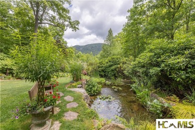 Nestled on 3.9 private, beautifully landscaped acres at the foot - photo 46