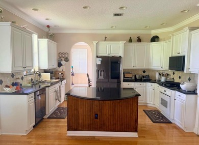 Beautiful Golf & Lake Front Home in desirable Madison Green - photo 2
