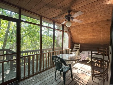 Enjoy year round relaxation as you sit on the deck and enjoy the - photo 4