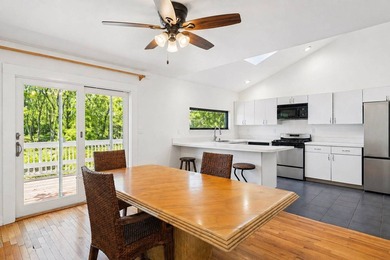 Set on just under an acre, this Wainscott property offers - photo 5