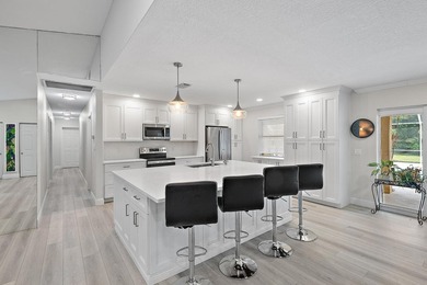 Back on the Market! NEW ROOF!Jupiter Farms Acre+ Retreat with - photo 1