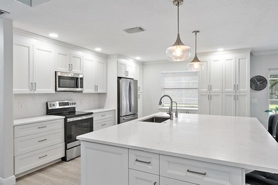 Back on the Market! NEW ROOF!Jupiter Farms Acre+ Retreat with - photo 4