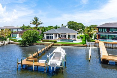 Nestled in the heart of Tequesta Country Club, this rare - photo 1