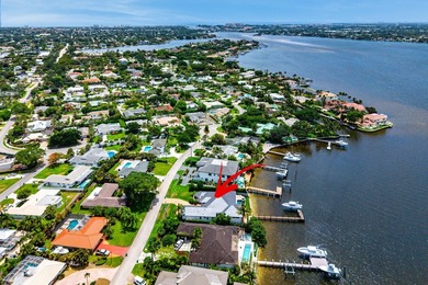 Nestled in the heart of Tequesta Country Club, this rare - photo 2