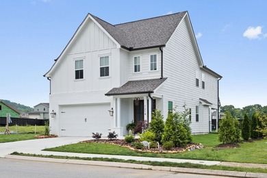 Welcome home to this charming 3-bedroom, 2.5-bath cottage - photo 1
