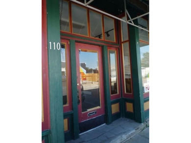 Located in downtown Rensselaer with green awnings highlighting - photo 3
