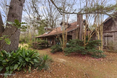 Tucked away on 3.6 acres this rustic charmer offers the perfect - photo 8