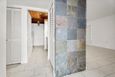 Welcome to this freshly painted, move-in-ready first-floor condo - photo 2