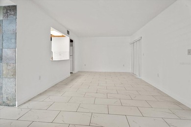 Welcome to this freshly painted, move-in-ready first-floor condo - photo 3