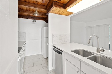 Welcome to this freshly painted, move-in-ready first-floor condo - photo 4