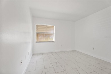 Welcome to this freshly painted, move-in-ready first-floor condo - photo 6