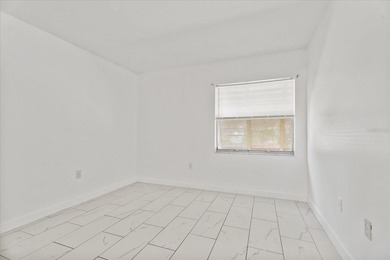 Welcome to this freshly painted, move-in-ready first-floor condo - photo 9