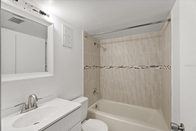 Welcome to this freshly painted, move-in-ready first-floor condo - photo 10
