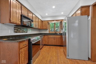 Rare opportunity on Morse Lake with 1.4 wooded acres - a setting - photo 15