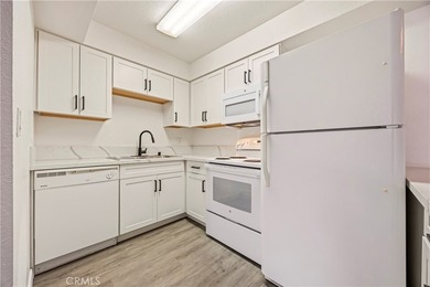 Move-in ready and beautifully updated 2-bedroom, 2-bath condo - photo 6