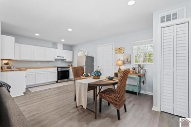 Looking for a lake house getaway? This newly renovated home has - photo 9
